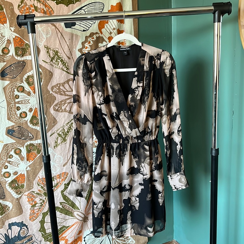 Very low cut sheer sleeve dress